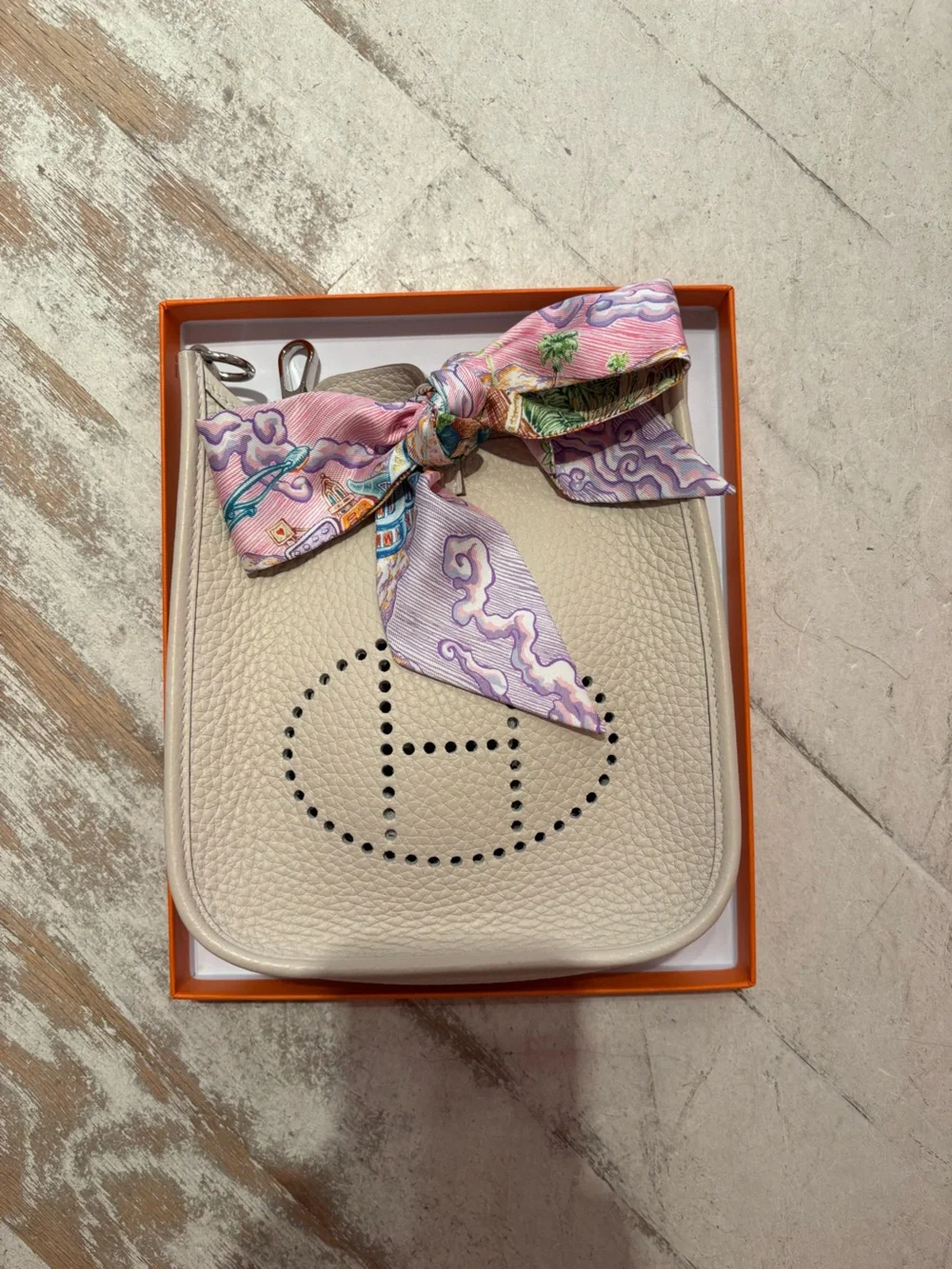 Hermes Cream Pebbled Leather Crossbody with Pink Scarf Accent
